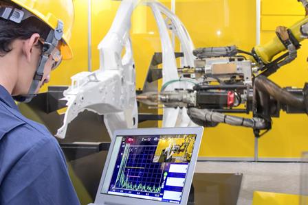 Advanced Diploma of Industrial Automation using robotic arm in factory.